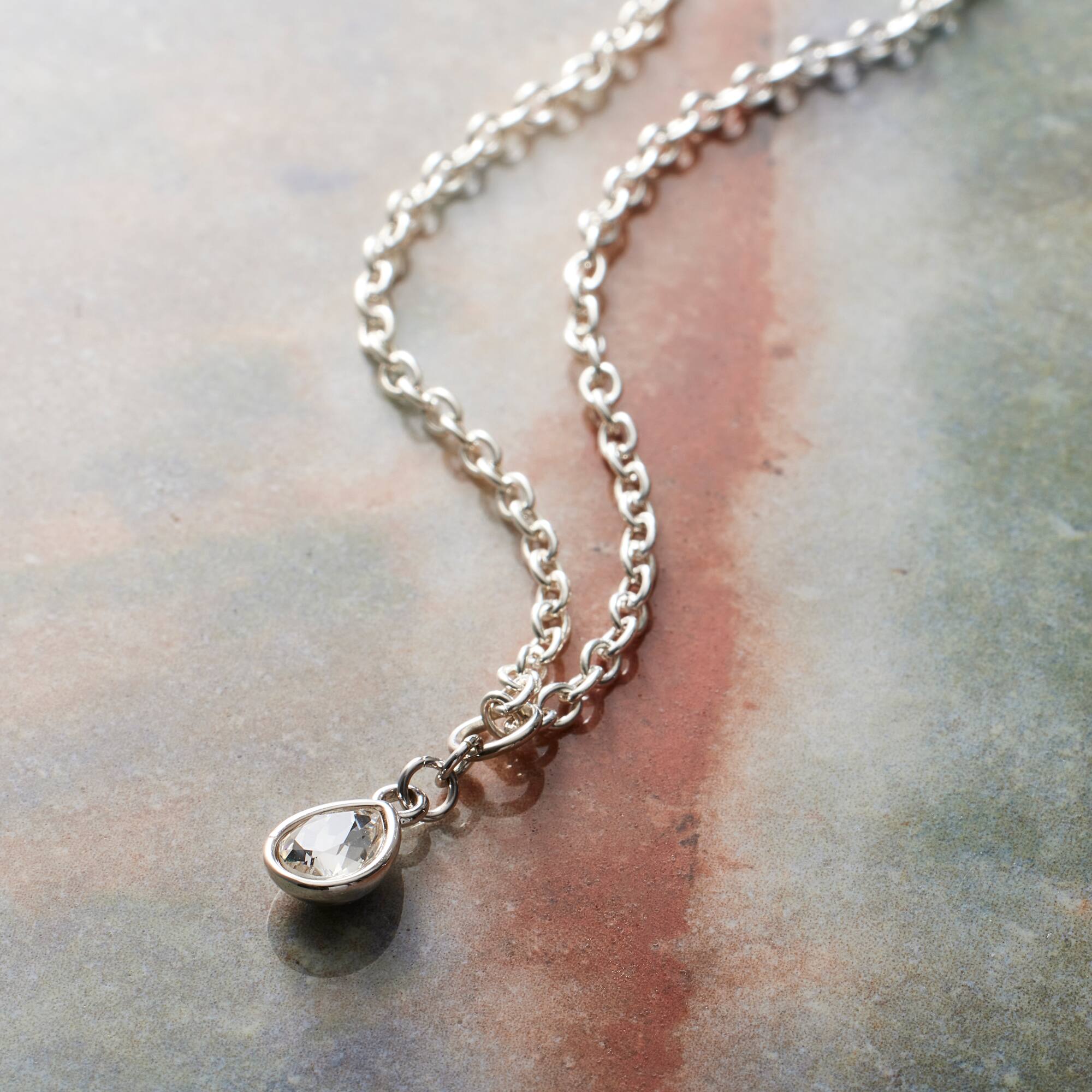 12 Pack: Austrian Crystal Rhodium Pear Charm by Bead Landing™
